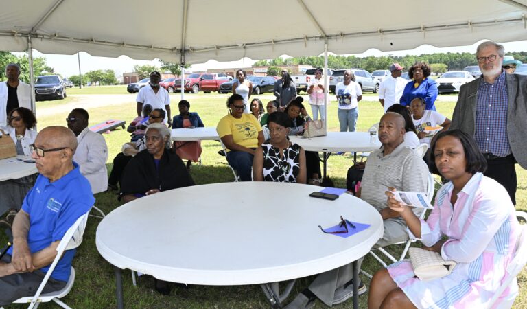 Attendees at Briggs De Laine Pearson Foundation ribbon cutting and open house for its new education center.