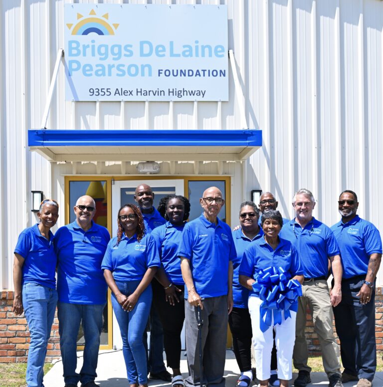 Briggs-De Laine-Pearson Foundation Board Members L-R: Celeste Boykin, Darreyl Walker, Margo Stukes, Clayton Pack, Lanitra Bennett, Joseph De Laine, Jr., Shirley Mitchell, Marguirite De Laine (Chairperson), Thomas Bradford (behind M. De Laine), Matt Grayson, Wayne Stewart. Board members not pictured: April Purvis, Esq., Lorenda Dasher and Dr. Roosevelt Gilliam, III.